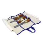 Set of bevel edge chisels in canvas tool roll